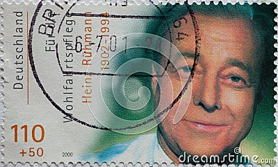a postage stamp from Germany, showing a portrait of the actor Heinz RÃ¼hmann on a charity donation postal sta Editorial Stock Photo