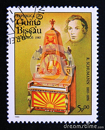 Postage stamp Guinea Bissau 1985. Pyramid Piano R. Schumann Editorial Stock Photo