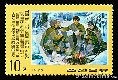 Postage stamp North Korea, 1975. Kim il sung distributes food rations Editorial Stock Photo