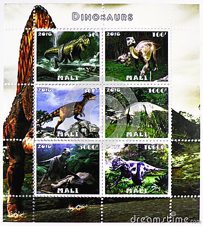 Postage stamp printed in Cinderellas shows Allosaurus and Triceratops Dinosaurs, Mali serie, circa 2016 Editorial Stock Photo