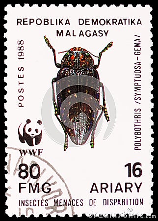 Postage stamp printed in Madagascar shows Jewel Beetle (Polybothris symptuosa), Global conservation: Insect serie, circa 1988 Editorial Stock Photo