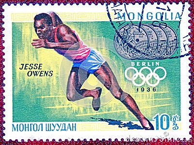 Postage stamp printed in Mongolia with a picture of four-time Olympic champion Jesse Owens Athletics Editorial Stock Photo