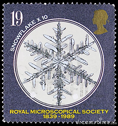 Postage stamp printed in United Kingdom shows Snowflake x 10, Royal Microscopical Society serie, circa 1989 Editorial Stock Photo