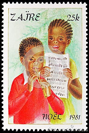 Postage stamp printed in Zaire Congo shows Children playing a flute, Christmas serie, circa 1981 Editorial Stock Photo