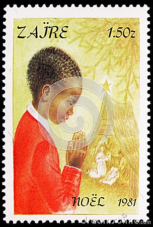 Postage stamp printed in Zaire Congo shows Praying child, Christmas serie, circa 1981 Editorial Stock Photo