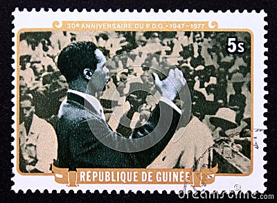 Postage stamp Republic of Guinea 1977. President Toure addressing rally Editorial Stock Photo