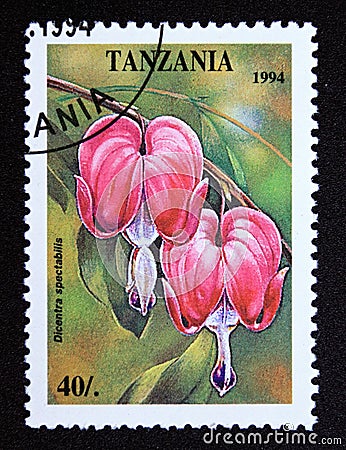 Postage stamp Tanzania, 1994. Dicentra spectabilis tropical flower Editorial Stock Photo