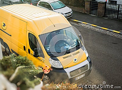 Postal van delivery parcel La Poste Editorial Stock Photo