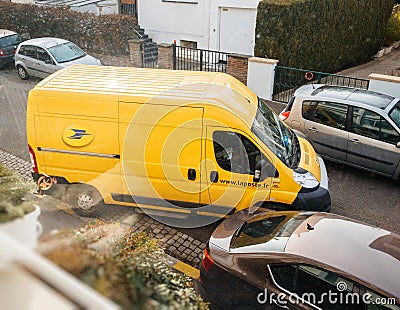 Postal van leaving after parcel delivery Editorial Stock Photo