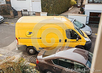 Postal van leaving after parcel delivery Editorial Stock Photo