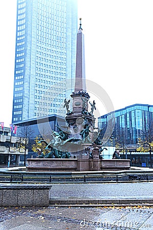 Obelisc classic baroque sculpture with people and pegasus old bronze Stock Photo