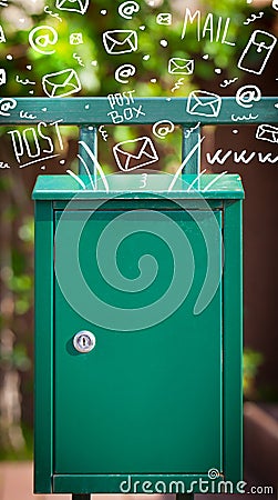 Postbox with white hand drawn mail icons Stock Photo