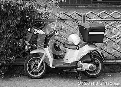 Poste Italiane mail delivery vehicle in black and white Editorial Stock Photo