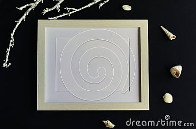 Poster frame mockup, top view, seashells on black background.Flat lay. Copy space Stock Photo