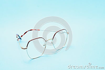 Poster of glasses on pastel background. Optics. Vision Stock Photo