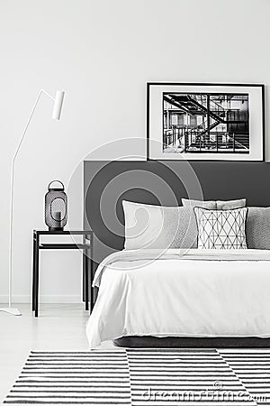 Poster in minimal bedroom interior Stock Photo