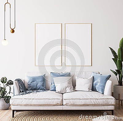 Poster mockup in bright modern room, white sofa with blue cushions and green plants on minimal background Stock Photo