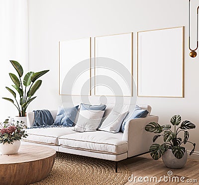 Poster mockup in bright modern room, white sofa with blue cushions and green plants on minimal background Stock Photo