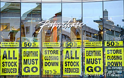 Posters advertising a Paperchase store closing down sale. Woking, Surrey. Editorial Stock Photo