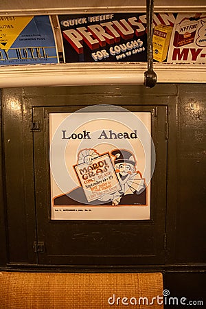 Posters at the subway station in the New York Transit Museum. Downtown Brooklyn, USA Editorial Stock Photo