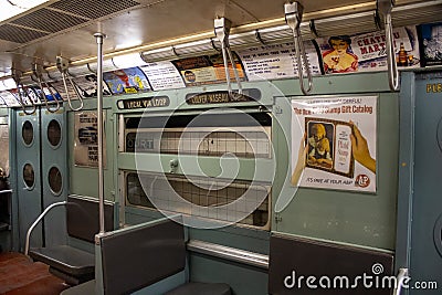 Posters at the subway station in the New York Transit Museum. Downtown Brooklyn, USA Editorial Stock Photo