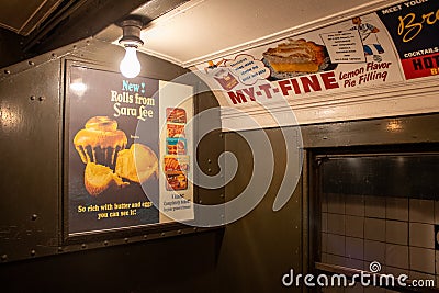 Posters at the subway station in the New York Transit Museum. Downtown Brooklyn, USA Editorial Stock Photo