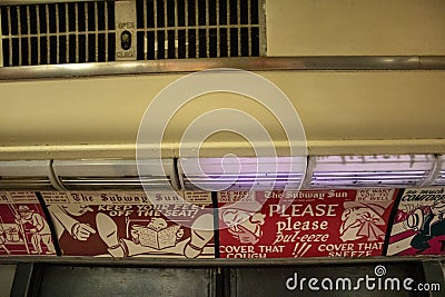 Posters at the subway station in the New York Transit Museum. Downtown Brooklyn, USA Editorial Stock Photo