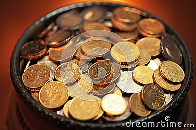 Pot of golden coins Stock Photo