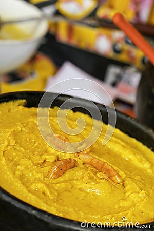 Pot of vatapa in the board of the baiana Stock Photo