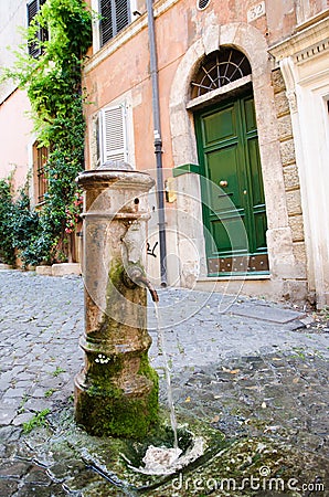 Potable fountain water in Rome Stock Photo