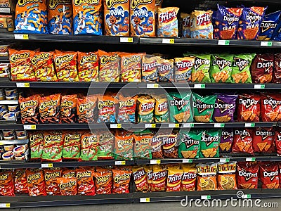 Potato Chip bags on Display in a supermarket. Editorial Stock Photo