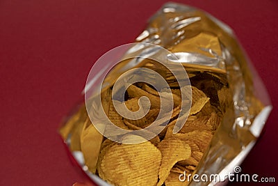 potato chips bag. Opened pack. Fast food and unhealthy eating concept Stock Photo