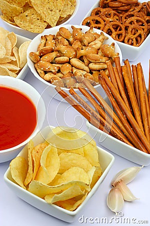 Potato chips and other salty snacks Stock Photo