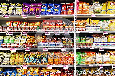 Potato chips and snacks in supermarket Editorial Stock Photo