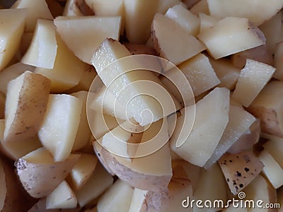 Potato cutting . Lots of two cut pieces. Stock Photo