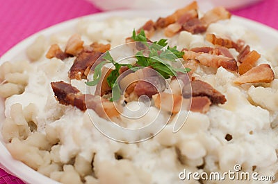 Potato gnocchi dumplings with sheep cheese and bacon Stock Photo