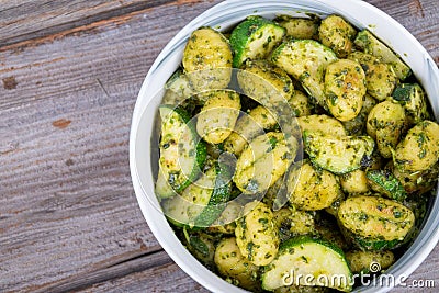 Potato gnocchi pasta with zucchinis and fresh pesto Stock Photo