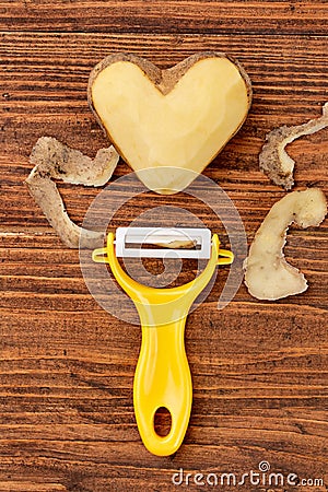 Potato heart over wooden background Stock Photo