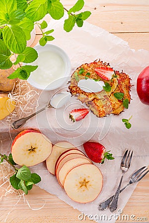 Potato pancakes with apfel and strawberry Stock Photo
