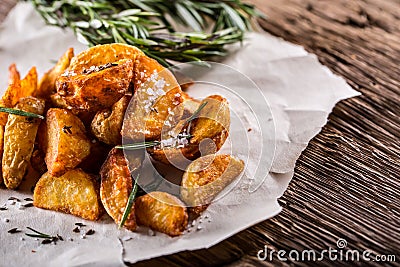 Potato. Roasted potatoes. American potatoes with salt rosemary and cumin. Roasted potato wedges delicious crispy Stock Photo