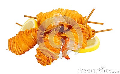 Potato string wrapped king prawns Stock Photo