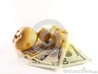 Potatoes and dollars. Food and money. Harvest, sale, income Stock Photo