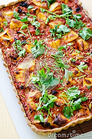 Potatoes and tomatoes vegan tart Stock Photo