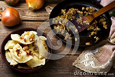 Potatoes vareniki in a ceramic bowl. Stock Photo