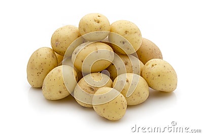 Potatoes on the white background. New harvest. Stock Photo