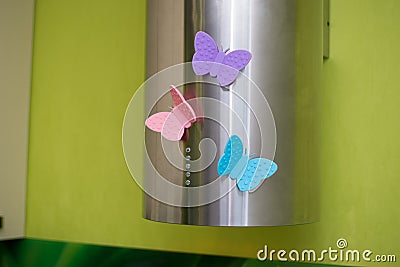 Potholders for hot in the kitchen colorful butterfly magnets Stock Photo