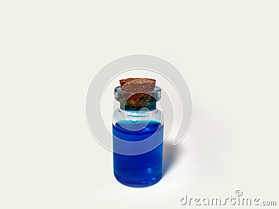 Potion with blue liquid. Alchemy set with flask. small glass bottle with colored mana liquid for game role play. magic potions Stock Photo