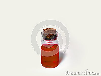 Potion with red liquid. Alchemy set with flask. small glass bottle with colored liquid for game role play. magic potions with cork Stock Photo