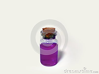 Potion with violet liquid. Alchemy set with flask. small glass bottle with colored liquid for game role play. magic potions with Stock Photo