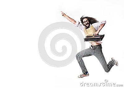 Potrait of a jumping nerd holding a briefcase Stock Photo